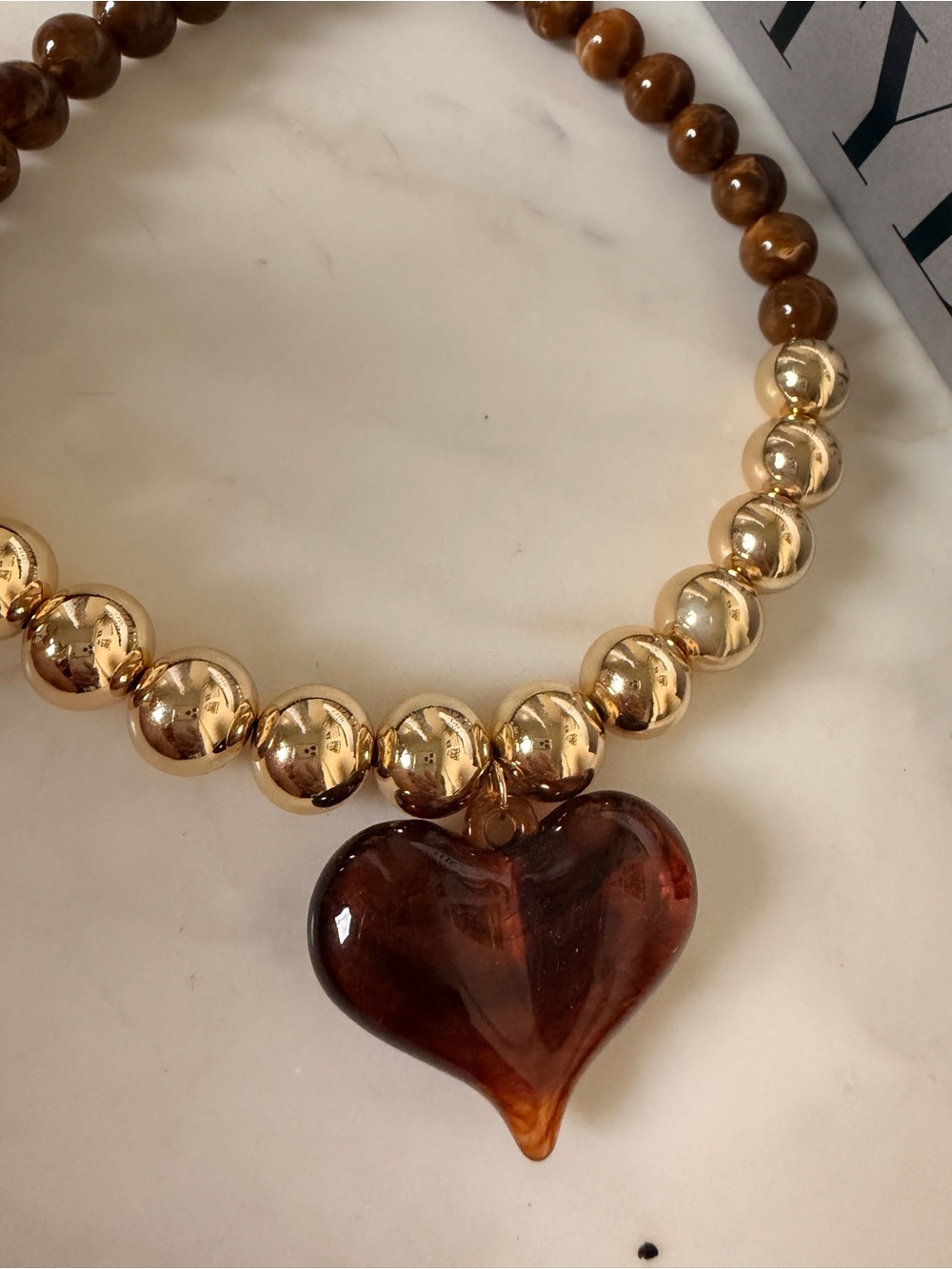 Gold Beaded Necklace with Brown Heart Pendant